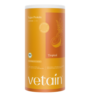 Vetain Vegan Protein Tropical in oranger Dose, frontal und freigestellt vor weißem Hintergrund.